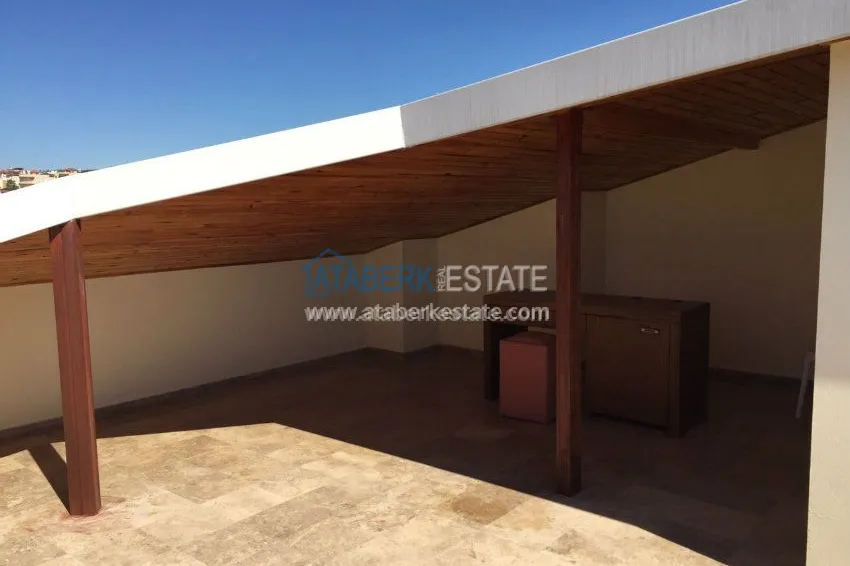 В районе Авсалар 3+1 дуплекс с камином и сауной. 26 