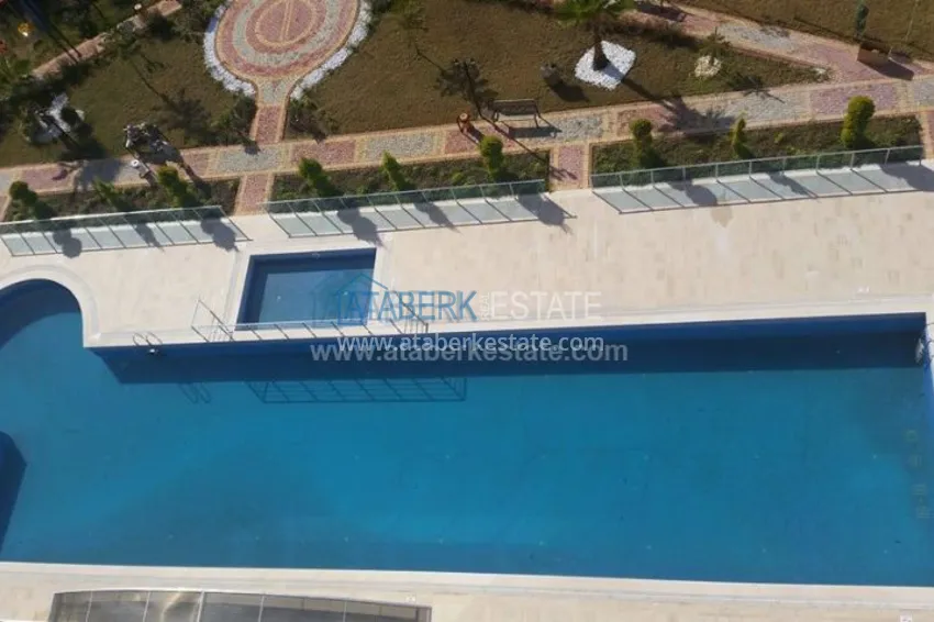 Квартира от собственника с двумя спальнями в комплексе с зимним бассейном в Махмутларе 19 