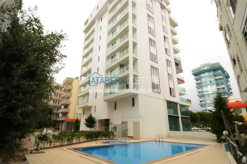 Апартаменты 1+1 в районе Махмутлар с видом на море 1 