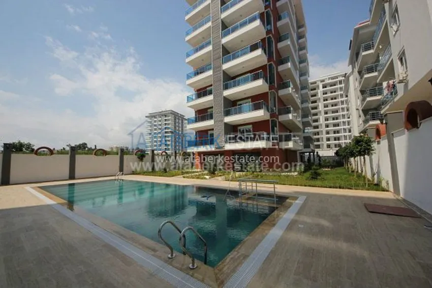 Двухкомнатные апартаменты в новом комплексе в Махмутларе 1 