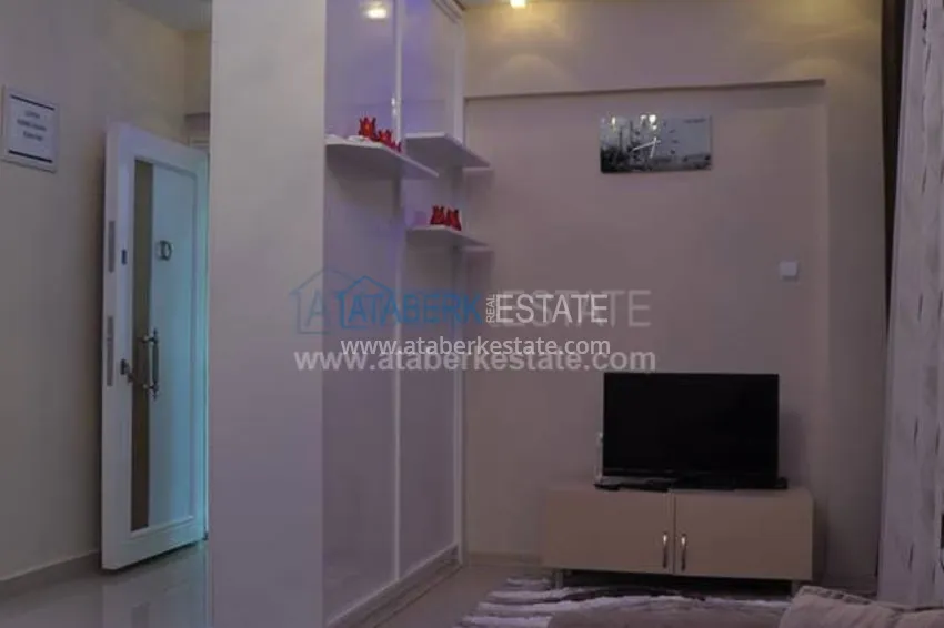 Квартира в комплексе на первой береговой линии в центре Алании 21 