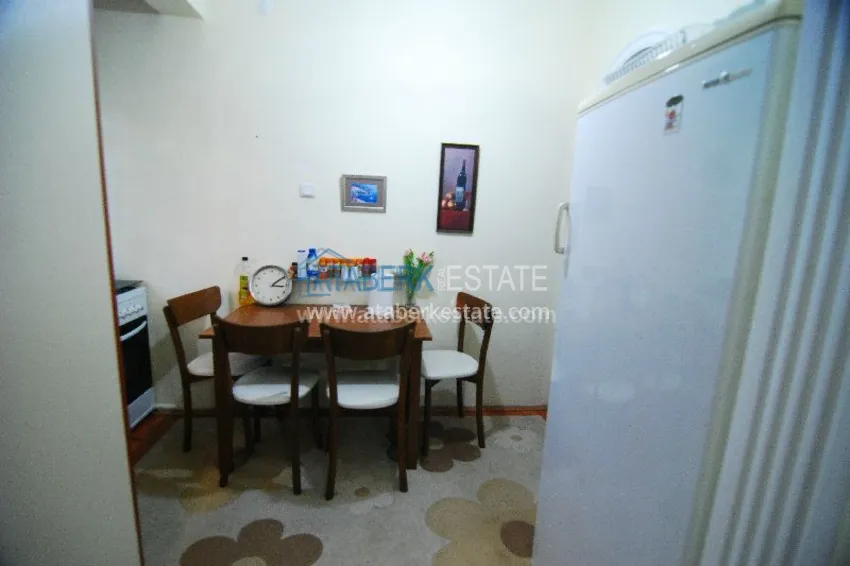 Двухкомнатная с выходом в сад в центре города Алания. 2 