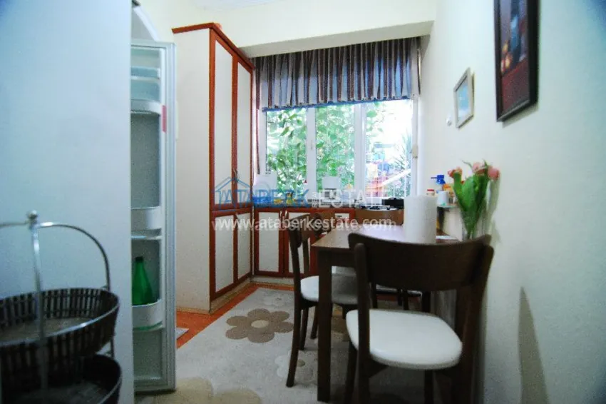 Двухкомнатная с выходом в сад в центре города Алания. 11 