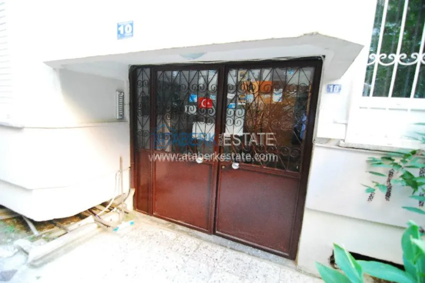 Двухкомнатная с выходом в сад в центре города Алания. 17 