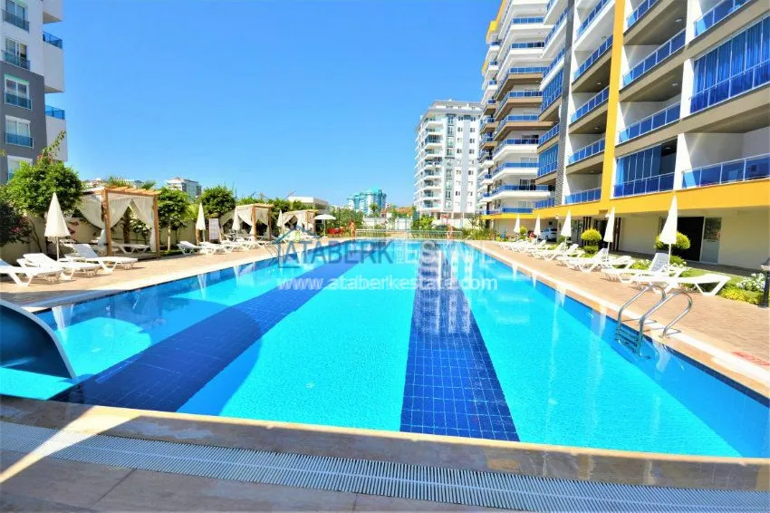 Трехкомнатная квартира в современном комплексе Махмутлара 11 