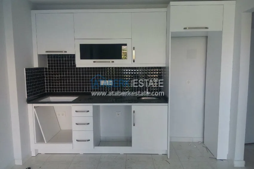 Апартаменты 1+1 с чистовой отделкой в Махмутлар. 13 