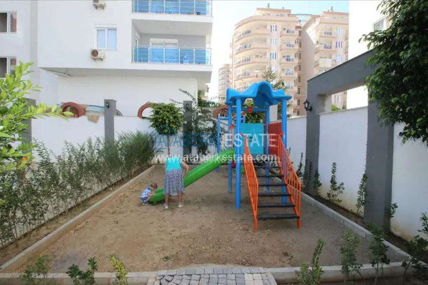 Двухкомнатные апартаменты в новом комплексе в Махмутларе 11 