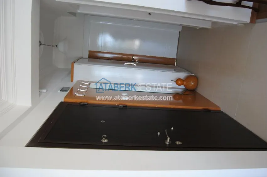 Квартира с ремонтом на первой береговой линии в Махмутларе 28 