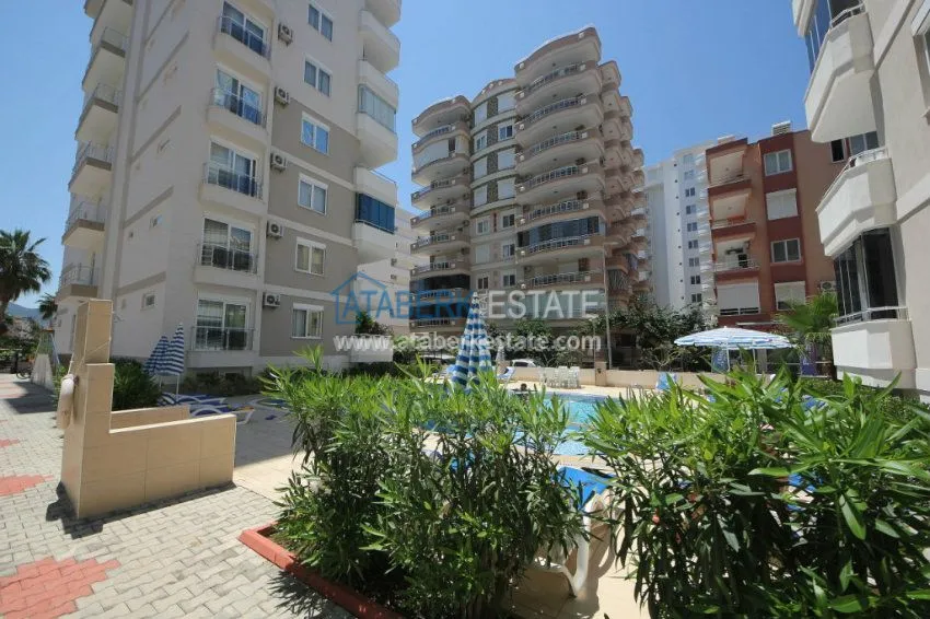 Комфортабельные апартаменты 1+1 в центре района Махмутлар 3 