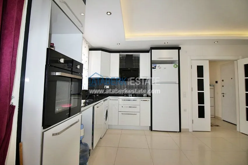 Меблированная квартира 1+1 в районе Махмутлар 14 