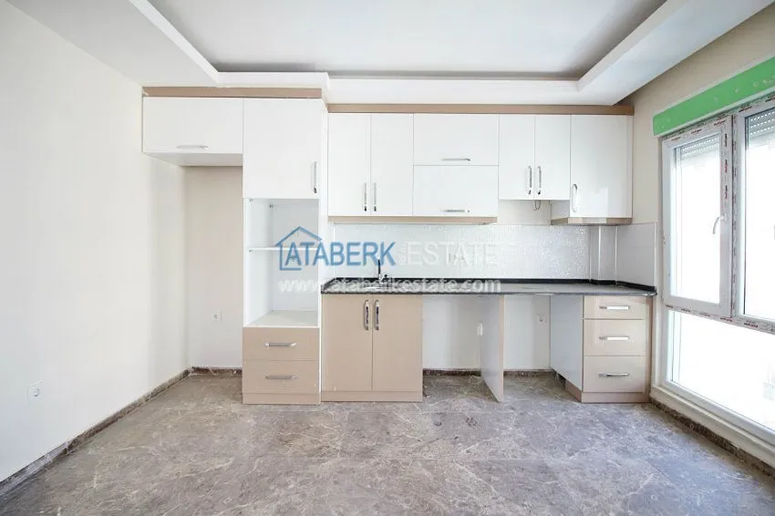 Квартира 1+1 в районе Махмутлар 7 