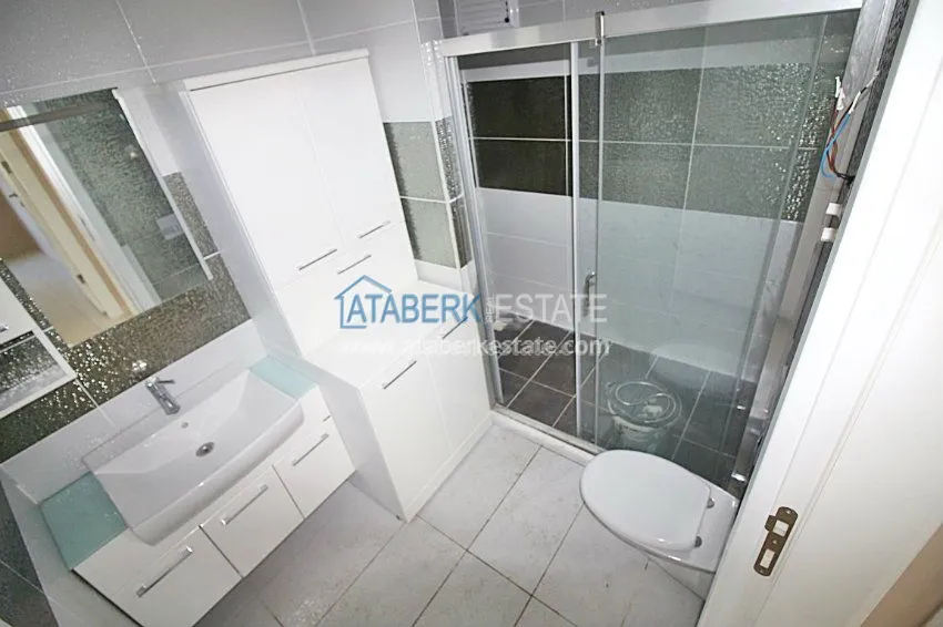 Четырехкомнатные апартаменты в районе Махмутлар 15 