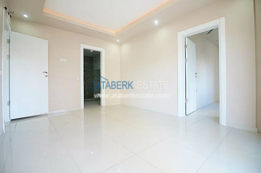 Четырехкомнатные апартаменты в районе Махмутлар 18 