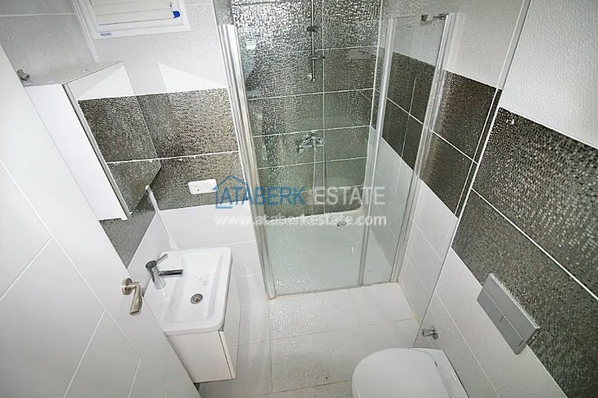 Четырехкомнатные апартаменты в районе Махмутлар 19 