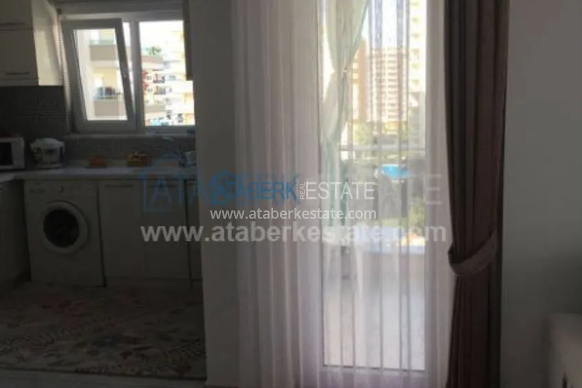 Квартира с одной спальней в Махмутлар. 18 