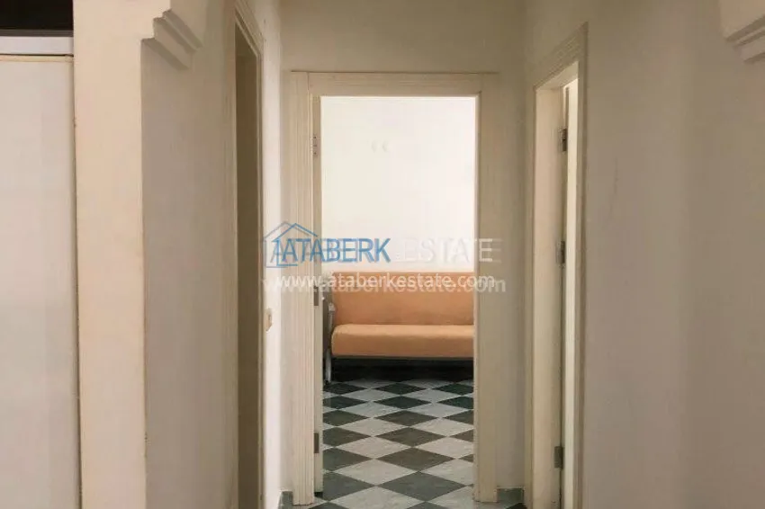 Меблированная двухкомнатная квартира в центре современного района Махмутлар.  20 