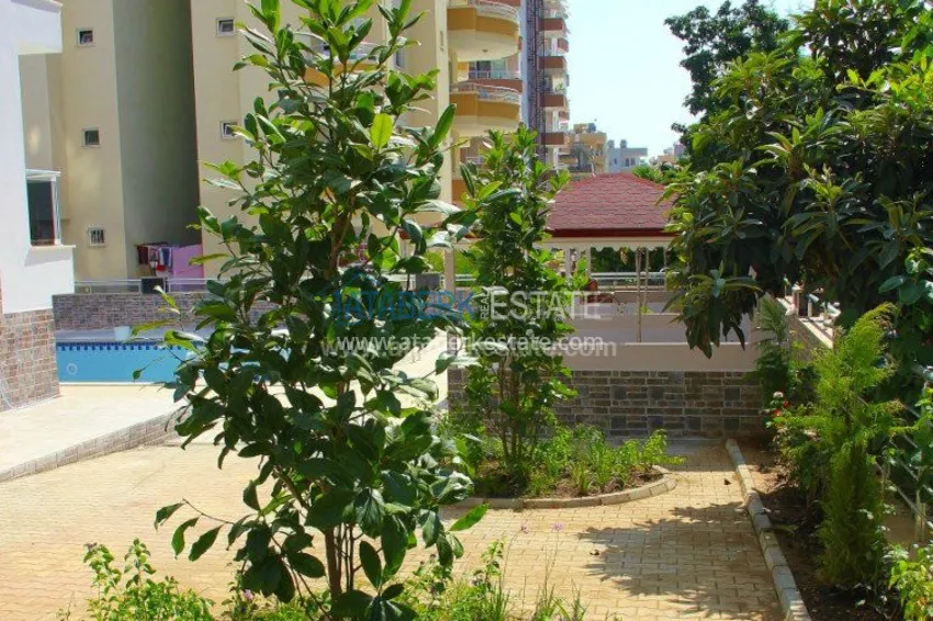 Квартира 1+1 по доступной цене в cовременном районе Алании – Махмутлар 5 