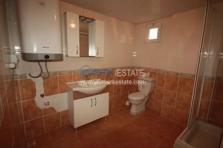 Недорогое предложение просторной трехкомнатной квартиры в самом центре популярного района Махмутлар 15 