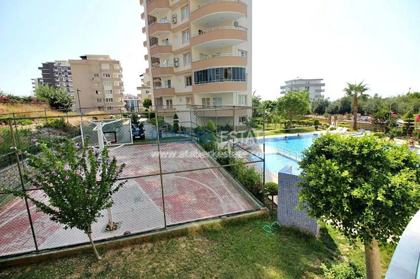 Трехкомнатная квартира в районе Махмутлар. 26 