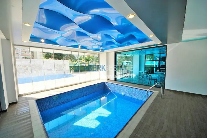 Трехкомнатная квартира в районе Махмутлар. 11 