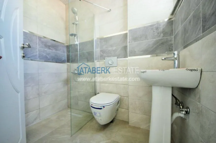 Трехкомнатная квартира в районе Махмутлар. 19 