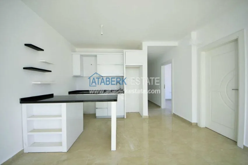 Трехкомнатная квартира в районе Махмутлар. 26 