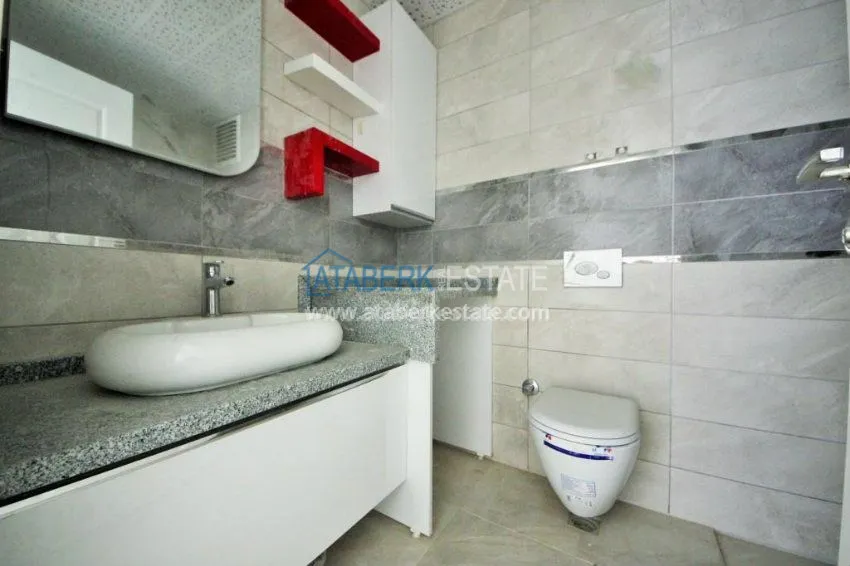 Трехкомнатная квартира в районе Махмутлар. 30 