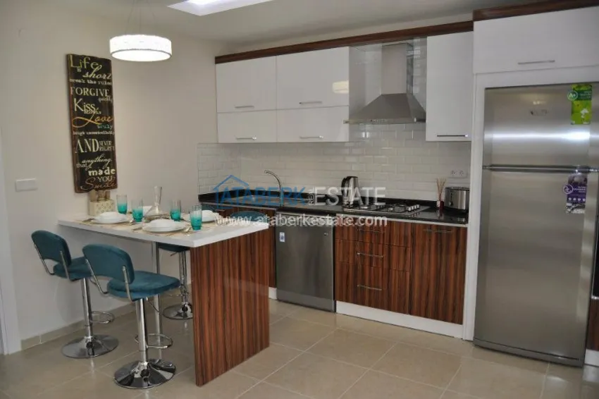 Готовый новый комплекс в самом центре района Махмутлар 22 