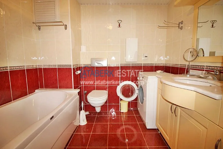 3+1 c частичным видом на море в Махмутларе 9 