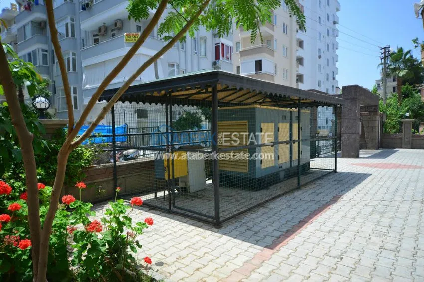 Апартаменты 1+1 в центре района Махмутлар 4 