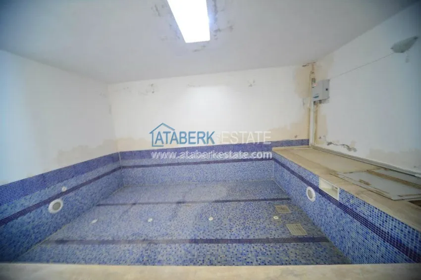 Апартаменты 1+1 в центре района Махмутлар 5 