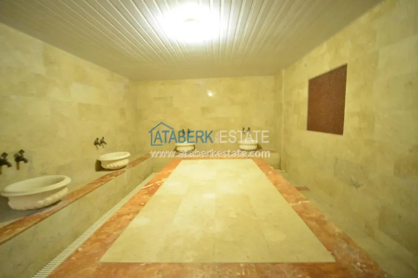 Апартаменты 1+1 в центре района Махмутлар 8 