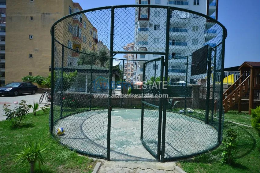 Апартаменты 1+1 в центре района Махмутлар 10 