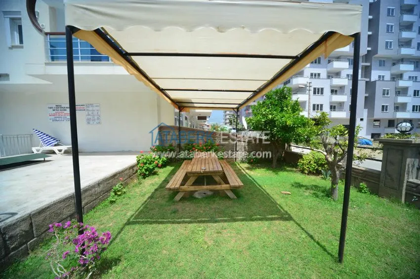 Апартаменты 1+1 в центре района Махмутлар 11 