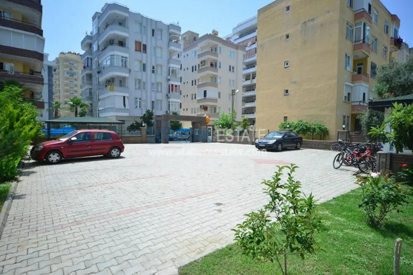 Апартаменты 1+1 в центре района Махмутлар 13 