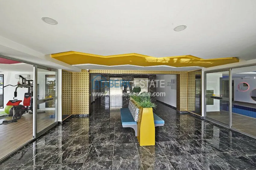 Трехкомнатная квартира в современном комплексе Махмутлара 29 