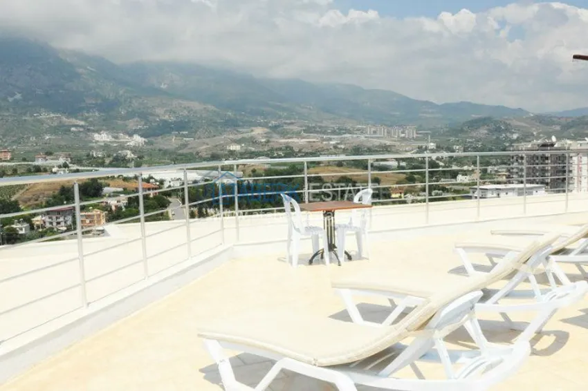 Квартира 2+1 в центре района Махмутлар. 12 