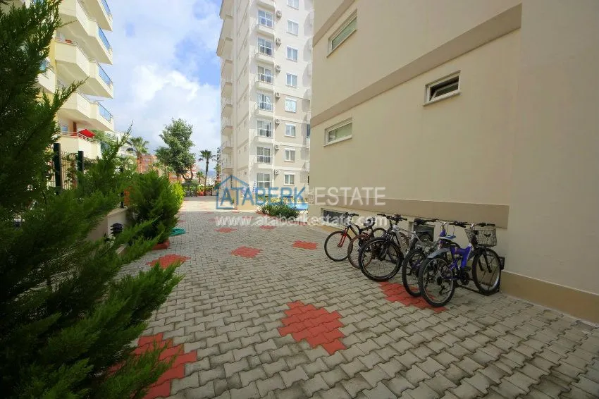 Комфортабельные апартаменты 1+1 в центре района Махмутлар 5 