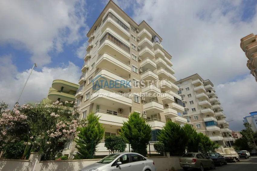 Комфортабельные апартаменты 1+1 в центре района Махмутлар 1 