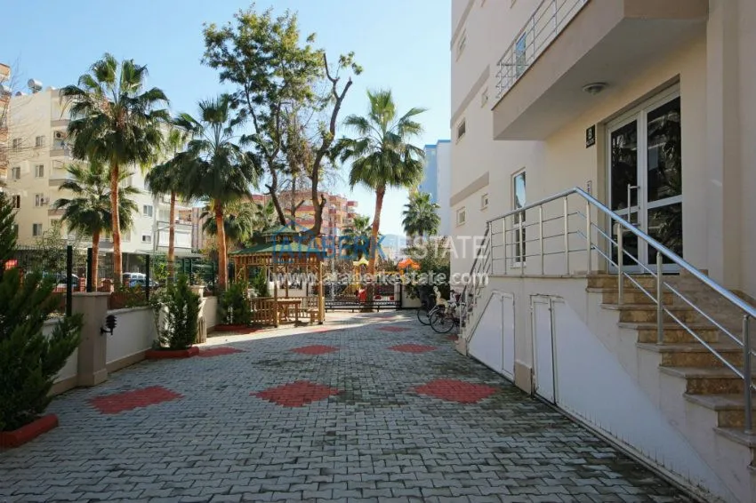 Комфортабельные апартаменты 1+1 в центре района Махмутлар 9 