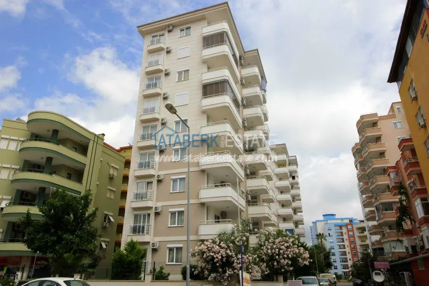 Комфортабельные апартаменты 1+1 в центре района Махмутлар 13 