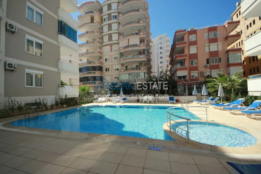 Комфортабельные апартаменты 1+1 в центре района Махмутлар 17 